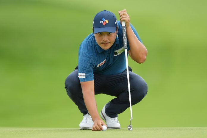 K.H. Lee of Korea lines up a putt on the fourth green during the third round of the Travelers Championship at TPC River Highlands on Saturday in Cromwell, Connecticut. (Photo by Drew Hallowell/Getty Images)
