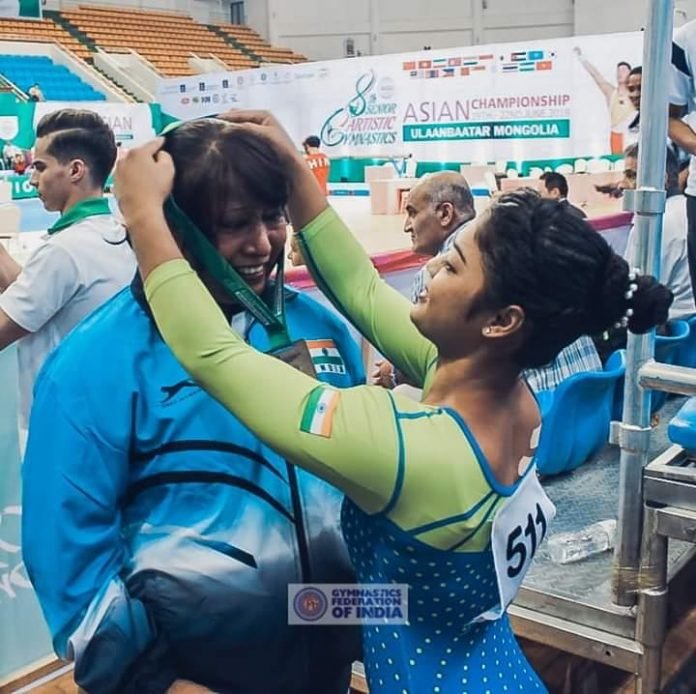 Coach Minara Begum (left) has been the mainstay behind Pranati Nayak's success and qualification to the Tokyo Olympics as the lone Indian gymnast. Photo credit: SportSavour