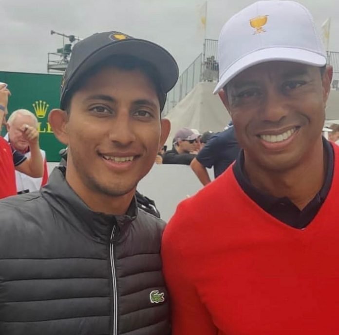 Kartik Sharma walked inside the ropes with Tiger Woods during practice at the 2019 Junior Presidents Cup in Melbourne.