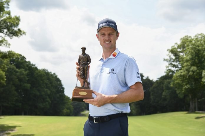 Justin Rose of England is photographed with the Payne Stewart Award on Jamestown Park Golf Course in Jamestown, North Carolina. (Photo by Chris Condon/PGA TOUR)