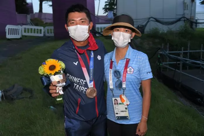 WhatsApp Image 2021-08-02 at 12.36.07 Wife Michelle, who was on the bag last week, with CT Pan as he poses with his Olympic golf bronze at the Kasumigaseki Country Club on Sunday. Photo: IGF