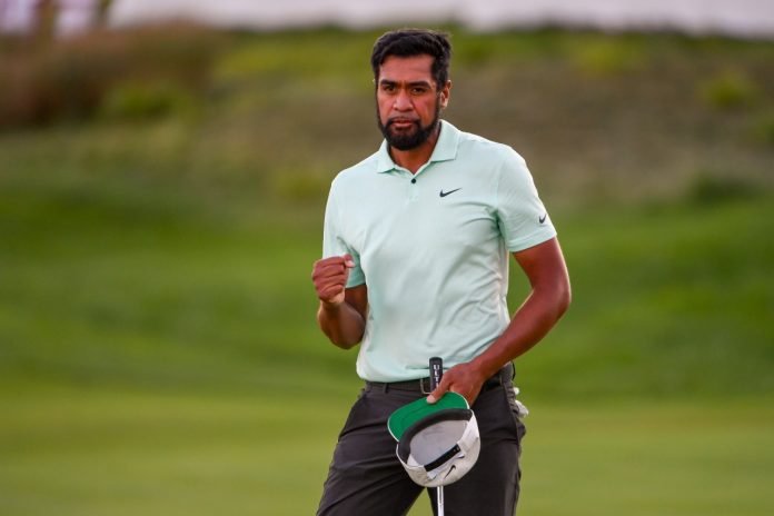 Tony Finau reacts to winning in a playoff during the weather delayed final round of THE NORTHERN TRUST at Liberty National Golf Club in Jersey City, New Jersey on Monday. (Photo by Tracy Wilcox/PGA TOUR via Getty Images)