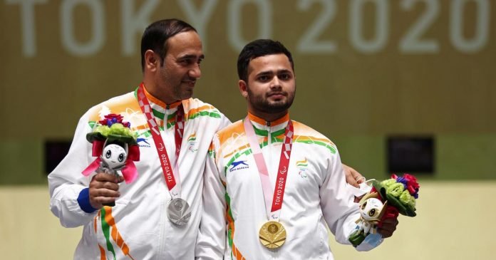 Singhraj Adana (left) and Manish Narwal won silver and gold in the Mixed 50m Pistol SH1 at the Tokyo Paralympics on Saturday.